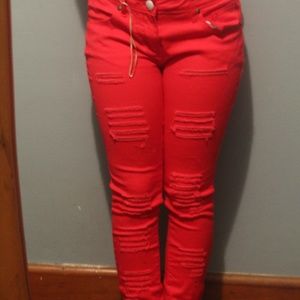 Red ripped jeans